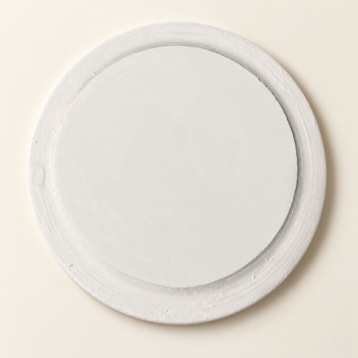 Underside of a white Break A Plate celebration plate